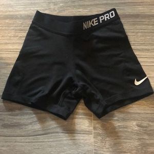 Black Nike pros. Kids size medium.